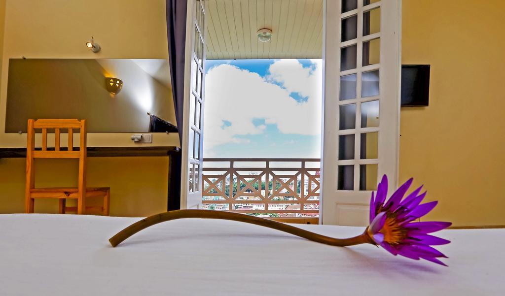 Le Lotus Bleu Hotel Antananarivo Szoba fotó